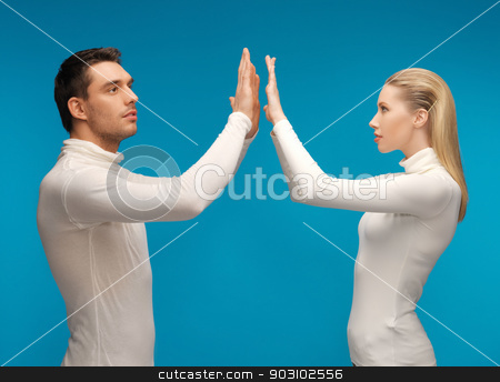 To use this stock image in your creative project, please select the size you need over to the right and click the "Add to Cart" button.
Your downloaded image will come with the Cutcaster watermark removed so don’t worry about the watermark you see on this page. man and woman working with something imaginary stock photo, picture of man and woman working with something imaginary. by Syda Productions