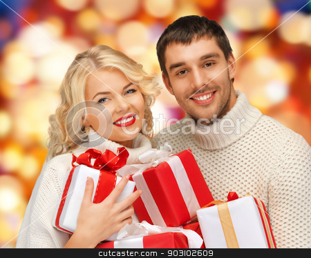 To use this stock image in your creative project, please select the size you need over to the right and click the "Add to Cart" button.
Your downloaded image will come with the Cutcaster watermark removed so don’t worry about the watermark you see on this page. family couple in a sweaters with gift boxes stock photo, picture of family couple in a sweaters with gift boxes by Syda Productions