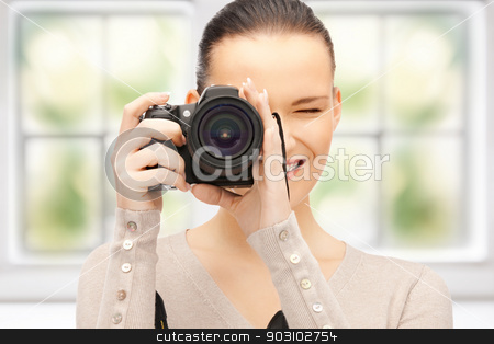 To use this stock image in your creative project, please select the size you need over to the right and click the "Add to Cart" button.
Your downloaded image will come with the Cutcaster watermark removed so don’t worry about the watermark you see on this page. teenage girl with digital camera stock photo, picture of happy teenage girl with digital camera by Syda Productions