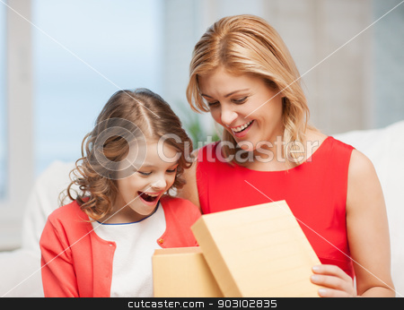 To use this stock image in your creative project, please select the size you need over to the right and click the "Add to Cart" button.
Your downloaded image will come with the Cutcaster watermark removed so don’t worry about the watermark you see on this page. mother and daughter stock photo, picture of mother and daughter with box by Syda Productions