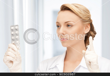 To use this stock image in your creative project, please select the size you need over to the right and click the "Add to Cart" button.
Your downloaded image will come with the Cutcaster watermark removed so don’t worry about the watermark you see on this page. attractive female doctor with pills stock photo, picture of attractive female doctor with pills by Syda Productions
