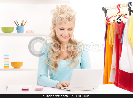 To use this stock image in your creative project, please select the size you need over to the right and click the "Add to Cart" button.
Your downloaded image will come with the Cutcaster watermark removed so don’t worry about the watermark you see on this page. happy woman with laptop computer stock photo, picture of happy woman with laptop computer by Syda Productions
