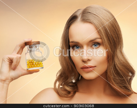 To use this stock image in your creative project, please select the size you need over to the right and click the "Add to Cart" button.
Your downloaded image will come with the Cutcaster watermark removed so don’t worry about the watermark you see on this page. woman with vitamins stock photo, bright picture of beautiful woman with vitamins by Syda Productions