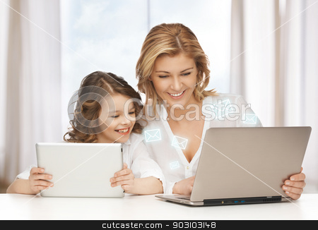 To use this stock image in your creative project, please select the size you need over to the right and click the "Add to Cart" button.
Your downloaded image will come with the Cutcaster watermark removed so don’t worry about the watermark you see on this page. mother and daughter stock photo, mother and daughter with laptop and tablet pc by Syda Productions
