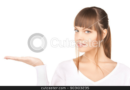 To use this stock image in your creative project, please select the size you need over to the right and click the "Add to Cart" button.
Your downloaded image will come with the Cutcaster watermark removed so don’t worry about the watermark you see on this page. something on the palm stock photo, smiling woman showing something on the palm of her hand by Syda Productions