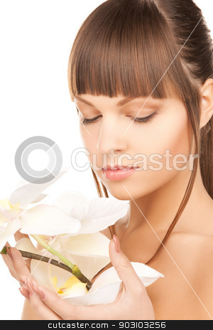 To use this stock image in your creative project, please select the size you need over to the right and click the "Add to Cart" button.
Your downloaded image will come with the Cutcaster watermark removed so don’t worry about the watermark you see on this page. lovely woman with orchid flower stock photo, bright picture of lovely woman with orchid flower. by Syda Productions