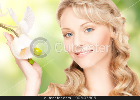 To use this stock image in your creative project, please select the size you need over to the right and click the "Add to Cart" button.
Your downloaded image will come with the Cutcaster watermark removed so don’t worry about the watermark you see on this page. beautiful woman with orchid flower stock photo, picture of beautiful woman with orchid flower by Syda Productions