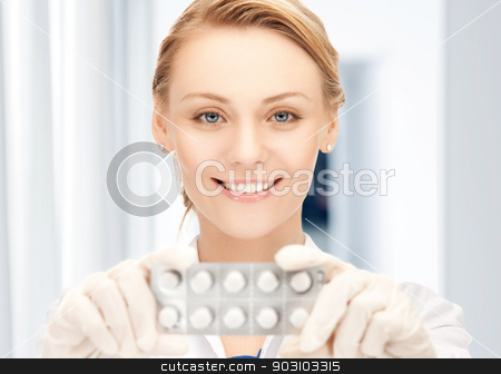 To use this stock image in your creative project, please select the size you need over to the right and click the "Add to Cart" button.
Your downloaded image will come with the Cutcaster watermark removed so don’t worry about the watermark you see on this page. attractive female doctor with pills stock photo, picture of attractive female doctor with pills by Syda Productions