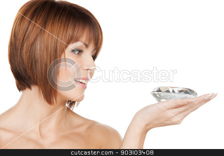 To use this stock image in your creative project, please select the size you need over to the right and click the "Add to Cart" button.
Your downloaded image will come with the Cutcaster watermark removed so don’t worry about the watermark you see on this page. beautiful woman with diamond stock photo, face and hands of beautiful woman with diamond by Syda Productions
