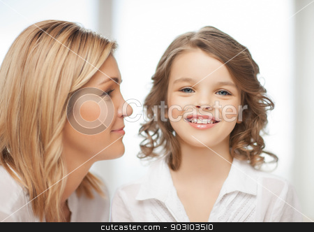 To use this stock image in your creative project, please select the size you need over to the right and click the "Add to Cart" button.
Your downloaded image will come with the Cutcaster watermark removed so don’t worry about the watermark you see on this page. mother and daughter stock photo, bright closeup picture of mother and daughter by Syda Productions