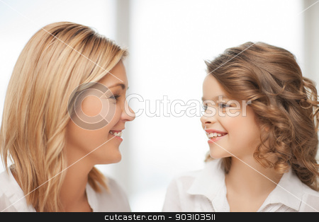 To use this stock image in your creative project, please select the size you need over to the right and click the "Add to Cart" button.
Your downloaded image will come with the Cutcaster watermark removed so don’t worry about the watermark you see on this page. mother and daughter stock photo, bright closeup picture of mother and daughter by Syda Productions
