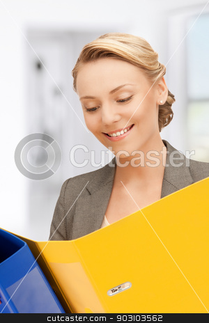 To use this stock image in your creative project, please select the size you need over to the right and click the "Add to Cart" button.
Your downloaded image will come with the Cutcaster watermark removed so don’t worry about the watermark you see on this page. smiling woman with folders stock photo, bright picture of smiling woman with folders by Syda Productions