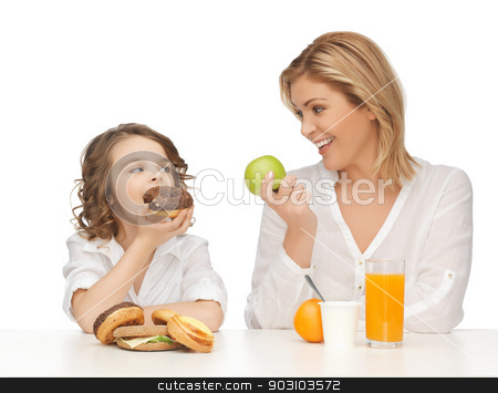 To use this stock image in your creative project, please select the size you need over to the right and click the "Add to Cart" button.
Your downloaded image will come with the Cutcaster watermark removed so don’t worry about the watermark you see on this page. mother and daughter stock photo, mother and daughter with healthy and unhealthy food by Syda Productions