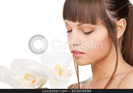 To use this stock image in your creative project, please select the size you need over to the right and click the "Add to Cart" button.
Your downloaded image will come with the Cutcaster watermark removed so don’t worry about the watermark you see on this page. lovely woman with orchid flower stock photo, bright picture of lovely woman with orchid flower. by Syda Productions