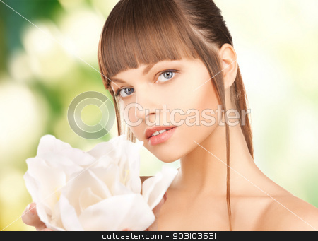 To use this stock image in your creative project, please select the size you need over to the right and click the "Add to Cart" button.
Your downloaded image will come with the Cutcaster watermark removed so don’t worry about the watermark you see on this page. beautiful woman with orchid flower stock photo, picture of beautiful woman with orchid flower by Syda Productions