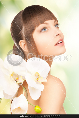 To use this stock image in your creative project, please select the size you need over to the right and click the "Add to Cart" button.
Your downloaded image will come with the Cutcaster watermark removed so don’t worry about the watermark you see on this page. beautiful woman with orchid flower stock photo, picture of beautiful woman with orchid flower by Syda Productions