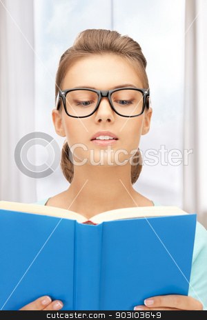 To use this stock image in your creative project, please select the size you need over to the right and click the "Add to Cart" button.
Your downloaded image will come with the Cutcaster watermark removed so don’t worry about the watermark you see on this page. calm and serious woman with book stock photo, bright picture of calm and serious woman with book by Syda Productions