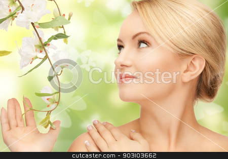 To use this stock image in your creative project, please select the size you need over to the right and click the "Add to Cart" button.
Your downloaded image will come with the Cutcaster watermark removed so don’t worry about the watermark you see on this page. woman with flowers on twig and butterflies stock photo, beautiful woman with flowers on twig and butterflies by Syda Productions