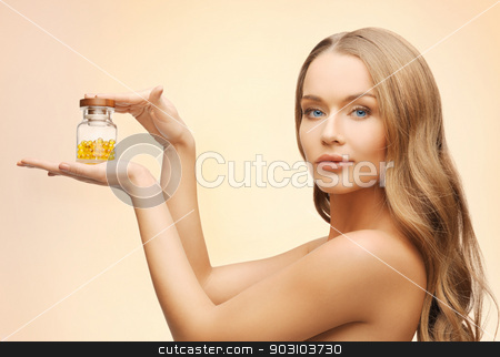 To use this stock image in your creative project, please select the size you need over to the right and click the "Add to Cart" button.
Your downloaded image will come with the Cutcaster watermark removed so don’t worry about the watermark you see on this page. woman with vitamins stock photo, bright picture of beautiful woman with vitamins by Syda Productions