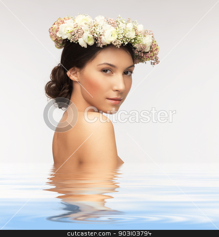 To use this stock image in your creative project, please select the size you need over to the right and click the "Add to Cart" button.
Your downloaded image will come with the Cutcaster watermark removed so don’t worry about the watermark you see on this page. woman wearing wreath of flowers stock photo, picture of young woman wearing wreath of flowers by Syda Productions