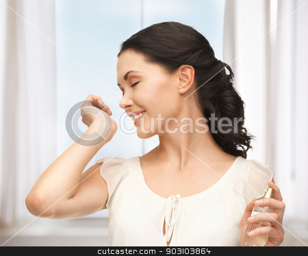 To use this stock image in your creative project, please select the size you need over to the right and click the "Add to Cart" button.
Your downloaded image will come with the Cutcaster watermark removed so don’t worry about the watermark you see on this page. beautiful woman with long hair stock photo, picture of beautiful woman smelling perfume on her hand by Syda Productions