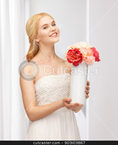 To use this stock image in your creative project, please select the size you need over to the right and click the "Add to Cart" button.
Your downloaded image will come with the Cutcaster watermark removed so don’t worry about the watermark you see on this page. woman with vase of flowers stock photo, picture of young and beautiful woman with vase of flowers by Syda Productions