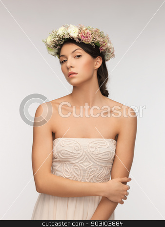 To use this stock image in your creative project, please select the size you need over to the right and click the "Add to Cart" button.
Your downloaded image will come with the Cutcaster watermark removed so don’t worry about the watermark you see on this page. woman wearing wreath of flowers stock photo, picture of young woman wearing wreath of flowers . by Syda Productions