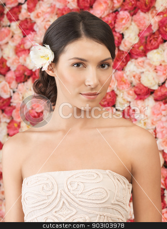 To use this stock image in your creative project, please select the size you need over to the right and click the "Add to Cart" button.
Your downloaded image will come with the Cutcaster watermark removed so don’t worry about the watermark you see on this page. woman with background full of roses stock photo, beautiful woman with background full of roses by Syda Productions