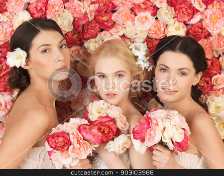 To use this stock image in your creative project, please select the size you need over to the right and click the "Add to Cart" button.
Your downloaded image will come with the Cutcaster watermark removed so don’t worry about the watermark you see on this page. three women with background full of roses stock photo, beautiful three women with background full of roses by Syda Productions