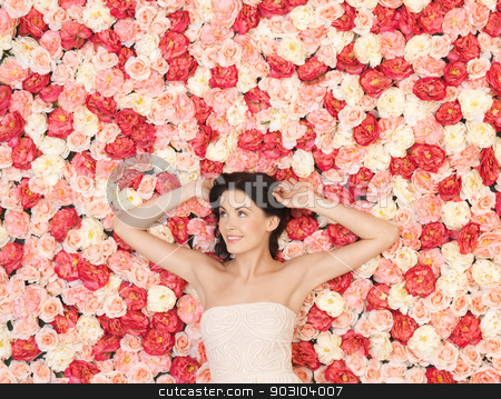 To use this stock image in your creative project, please select the size you need over to the right and click the "Add to Cart" button.
Your downloaded image will come with the Cutcaster watermark removed so don’t worry about the watermark you see on this page. young woman with background full of roses stock photo, beautiful and young woman with background full of roses by Syda Productions