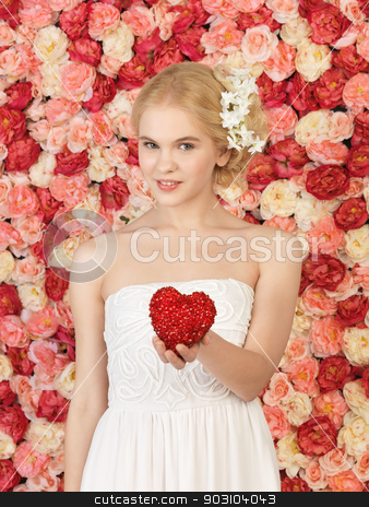 To use this stock image in your creative project, please select the size you need over to the right and click the "Add to Cart" button.
Your downloaded image will come with the Cutcaster watermark removed so don’t worry about the watermark you see on this page. woman with heart and background full of roses stock photo, young woman with heart and background full of roses by Syda Productions