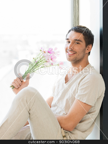 To use this stock image in your creative project, please select the size you need over to the right and click the "Add to Cart" button.
Your downloaded image will come with the Cutcaster watermark removed so don’t worry about the watermark you see on this page. man holding bouquet of flowers stock photo, man sitting on the windowsill holding bouquet of flowers... by Syda Productions