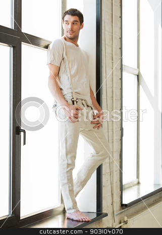To use this stock image in your creative project, please select the size you need over to the right and click the "Add to Cart" button.
Your downloaded image will come with the Cutcaster watermark removed so don’t worry about the watermark you see on this page. handsome man standing on the windowsill stock photo, portrait of handsome man standing on the windowsill by Syda Productions