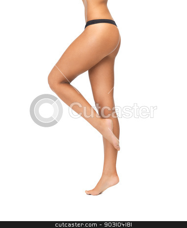 To use this stock image in your creative project, please select the size you need over to the right and click the "Add to Cart" button.
Your downloaded image will come with the Cutcaster watermark removed so don’t worry about the watermark you see on this page. female legs in black bikini panties stock photo, female legs in black bikini panties standing on one leg by Syda Productions