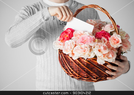To use this stock image in your creative project, please select the size you need over to the right and click the "Add to Cart" button.
Your downloaded image will come with the Cutcaster watermark removed so don’t worry about the watermark you see on this page. man holding basket full of flowers and postcard stock photo, close up of man holding basket full of flowers and postcard. by Syda Productions