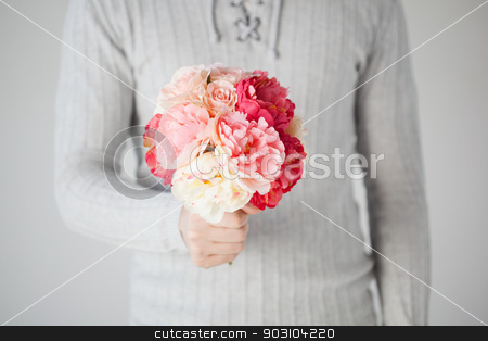 To use this stock image in your creative project, please select the size you need over to the right and click the "Add to Cart" button.
Your downloaded image will come with the Cutcaster watermark removed so don’t worry about the watermark you see on this page. man holding bouquet of flowers stock photo, close up of young man holding bouquet of flowers. by Syda Productions