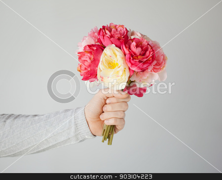To use this stock image in your creative project, please select the size you need over to the right and click the "Add to Cart" button.
Your downloaded image will come with the Cutcaster watermark removed so don’t worry about the watermark you see on this page. man's hand giving bouquet of flowers stock photo, close up of man's hand giving bouquet of flowers. by Syda Productions