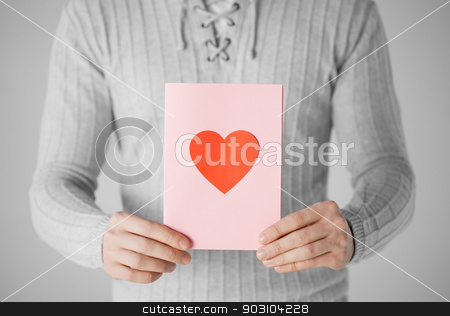 To use this stock image in your creative project, please select the size you need over to the right and click the "Add to Cart" button.
Your downloaded image will come with the Cutcaster watermark removed so don’t worry about the watermark you see on this page. man holding postcard with heart shape stock photo, close up of man holding postcard with heart shape. by Syda Productions
