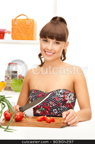 To use this stock image in your creative project, please select the size you need over to the right and click the "Add to Cart" button.
Your downloaded image will come with the Cutcaster watermark removed so don’t worry about the watermark you see on this page. beautiful woman in the kitchen cutting vegetables stock photo, beautiful woman in the kitchen cutting vegetables.. by Syda Productions