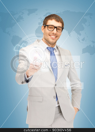 To use this stock image in your creative project, please select the size you need over to the right and click the "Add to Cart" button.
Your downloaded image will come with the Cutcaster watermark removed so don’t worry about the watermark you see on this page. businessman pressing virtual button stock photo, picture of handsome man pressing virtual button by Syda Productions