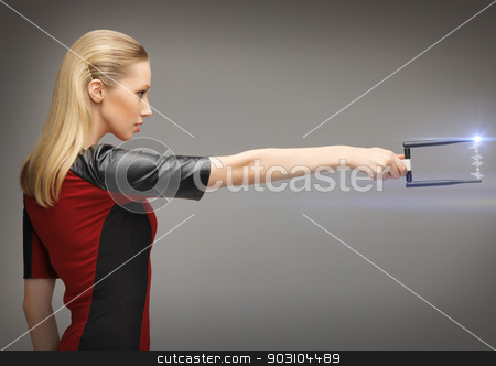 To use this stock image in your creative project, please select the size you need over to the right and click the "Add to Cart" button.
Your downloaded image will come with the Cutcaster watermark removed so don’t worry about the watermark you see on this page. woman with sci fi weapon stock photo, picture of futuristic woman with sci fi weapon by Syda Productions