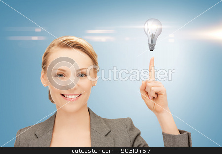 To use this stock image in your creative project, please select the size you need over to the right and click the "Add to Cart" button.
Your downloaded image will come with the Cutcaster watermark removed so don’t worry about the watermark you see on this page. woman pointing her finger at light bulb stock photo, beautiful woman pointing her finger at light bulb by Syda Productions
