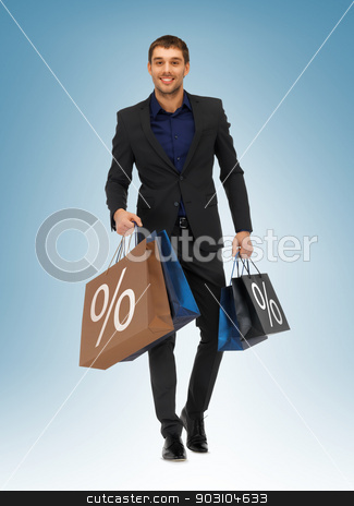 To use this stock image in your creative project, please select the size you need over to the right and click the "Add to Cart" button.
Your downloaded image will come with the Cutcaster watermark removed so don’t worry about the watermark you see on this page. man with shopping bags stock photo, picture of handsome man with shopping bags by Syda Productions