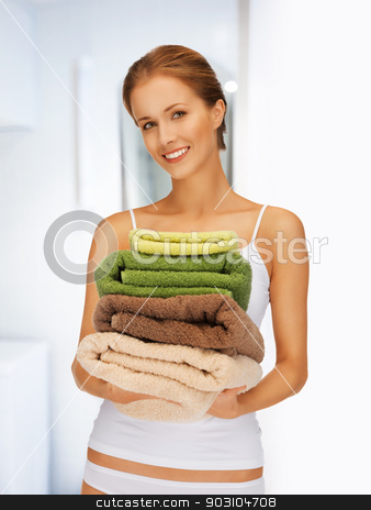 To use this stock image in your creative project, please select the size you need over to the right and click the "Add to Cart" button.
Your downloaded image will come with the Cutcaster watermark removed so don’t worry about the watermark you see on this page. lovely woman with towels stock photo, bright picture of lovely woman with towels by Syda Productions