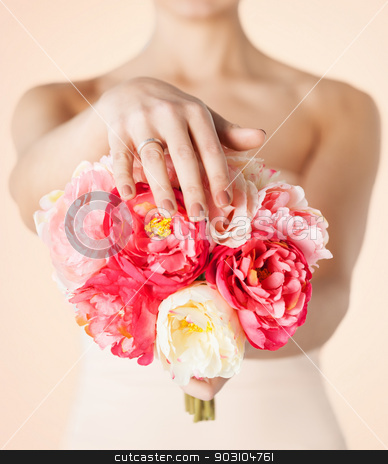 To use this stock image in your creative project, please select the size you need over to the right and click the "Add to Cart" button.
Your downloaded image will come with the Cutcaster watermark removed so don’t worry about the watermark you see on this page. bride with bouquet of flowers and wedding ring stock photo, close up of bride with bouquet of flowers and wedding ring by Syda Productions