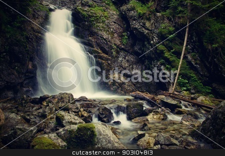 To use this stock image in your creative project, please select the size you need over to the right and click the "Add to Cart" button.
Your downloaded image will come with the Cutcaster watermark removed so don’t worry about the watermark you see on this page. Waterfall stock photo, Mighty huge waterfall in the forest, horizontal by richpav
