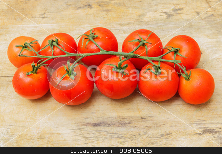 To use this stock image in your creative project, please select the size you need over to the right and click the "Add to Cart" button.
Your downloaded image will come with the Cutcaster watermark removed so don’t worry about the watermark you see on this page. Cherry tomato isolated over a wooden background. stock photo, Cherry tomato isolated over the background, not in the kitchen. by SONGSAK AROMYIM