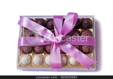 To use this stock image in your creative project, please select the size you need over to the right and click the "Add to Cart" button.
Your downloaded image will come with the Cutcaster watermark removed so don’t worry about the watermark you see on this page. Beautifully decorated and tied with a ribbon candy box on a whit stock photo, Box of delicious chocolates, nicely decorated and tied with a ribbon gift for any holiday or celebration. Presented on a white background by Georgina198