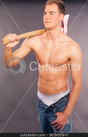 To use this stock image in your creative project, please select the size you need over to the right and click the "Add to Cart" button.
Your downloaded image will come with the Cutcaster watermark removed so don’t worry about the watermark you see on this page. Sexy muscular young man chopping fire wood stock photo, Sexy handsome muscular young man standing shirtless in jeans holding an axe on a graduated grey studio background by Roland Stollner
