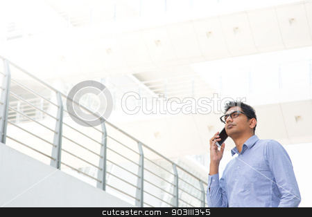 To use this stock image in your creative project, please select the size you need over to the right and click the "Add to Cart" button.
Your downloaded image will come with the Cutcaster watermark removed so don’t worry about the watermark you see on this page. Indian businessman on the phone stock photo, Young Asian Indian businessman on the phone, male business man, real modern office building as background. by szefei